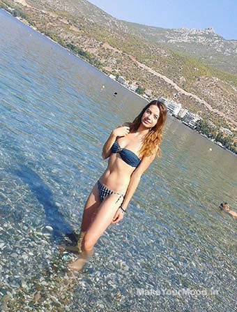 Kelie hot escort posing in bikini